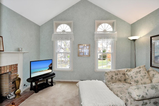 carpeted living room featuring a fireplace and lofted ceiling