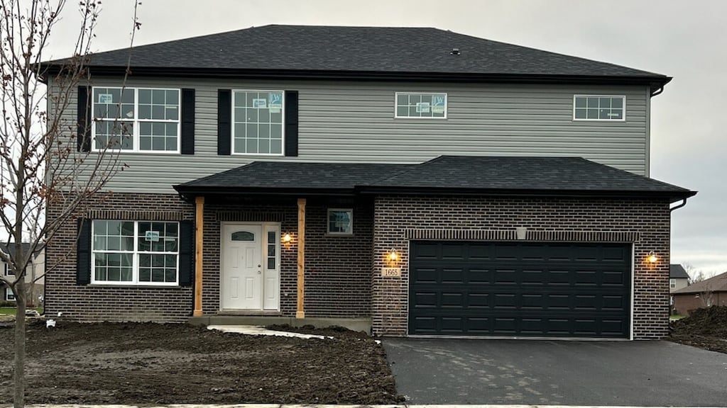 view of front property with a garage