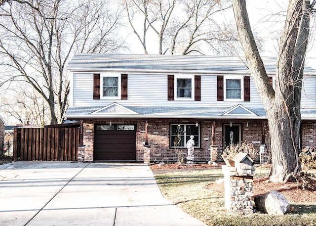 view of front of property featuring a garage