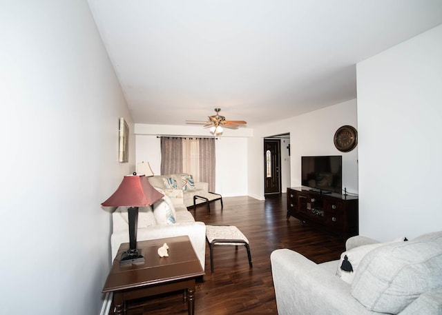 living room with dark hardwood / wood-style floors and ceiling fan