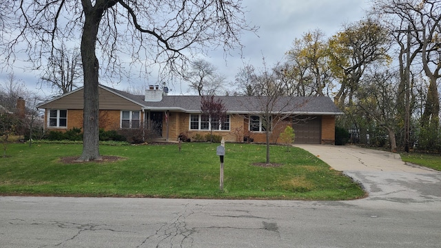 ranch-style home featuring a garage and a front lawn