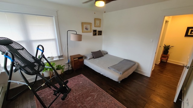 bedroom featuring dark hardwood / wood-style flooring