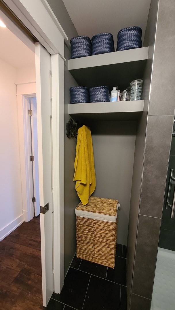 mudroom with dark hardwood / wood-style flooring