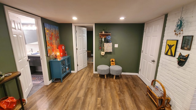 sitting room with dark hardwood / wood-style floors