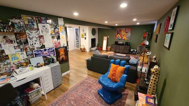 living room with light hardwood / wood-style floors