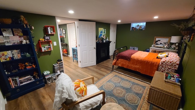 bedroom with light hardwood / wood-style flooring