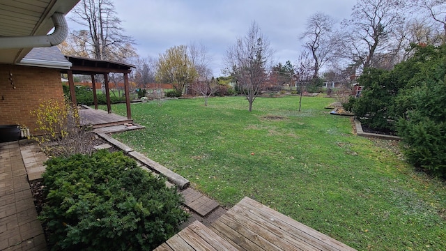 view of yard with a deck