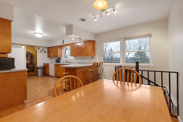 dining space featuring sink