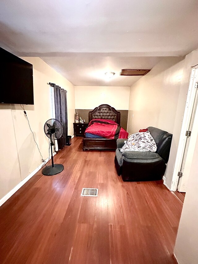 bedroom featuring hardwood / wood-style flooring