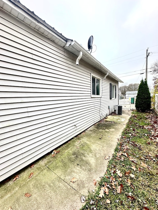 view of property exterior with cooling unit