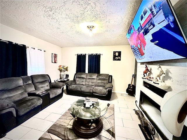 tiled living room with a textured ceiling