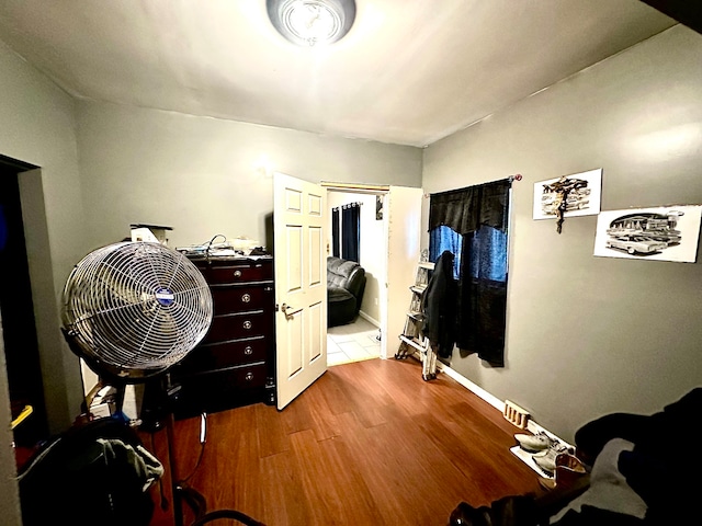 bedroom featuring hardwood / wood-style floors