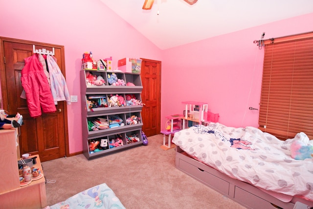 bedroom with ceiling fan, light carpet, and lofted ceiling