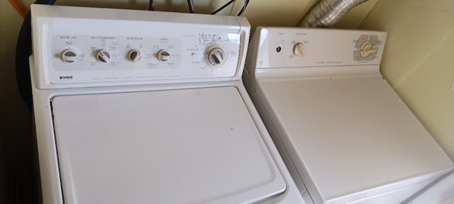 washroom featuring washer and dryer