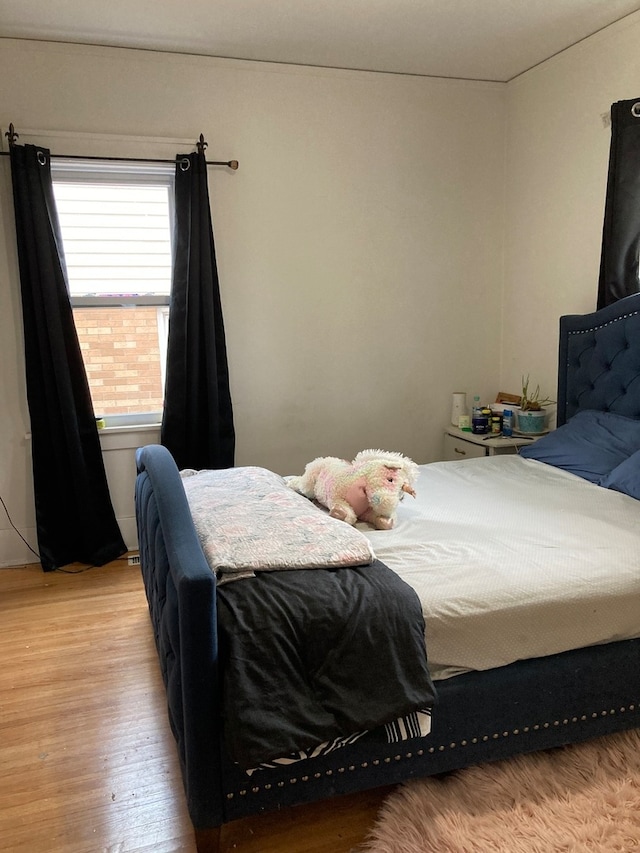 bedroom featuring light wood-type flooring