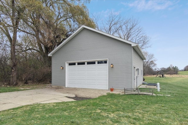 garage featuring a lawn