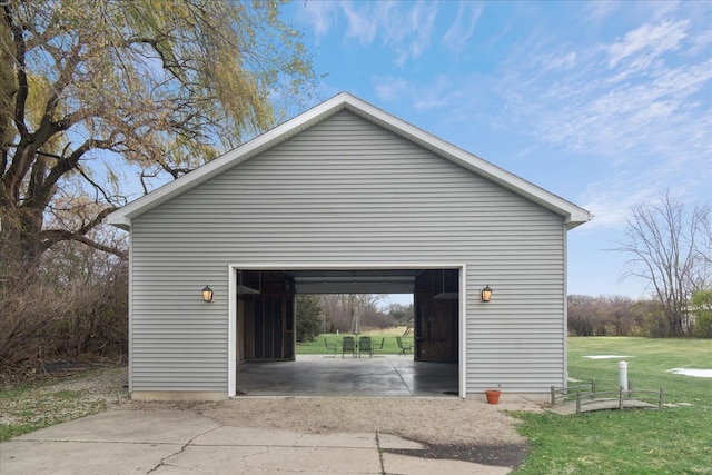 garage with a yard