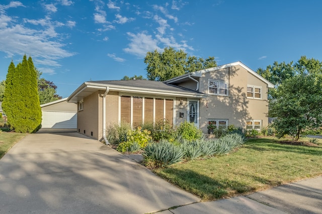 view of home's exterior with a yard and a garage