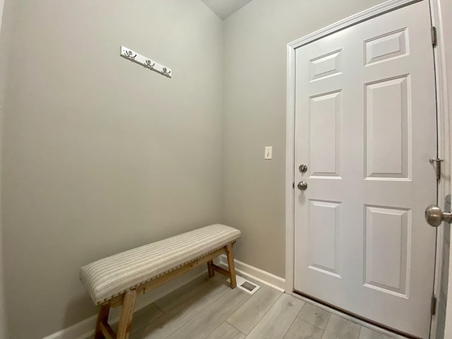 entryway with light hardwood / wood-style flooring