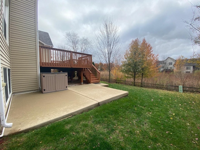 view of yard with a patio and a wooden deck