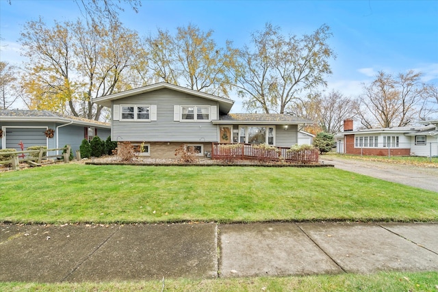 split level home with a front yard