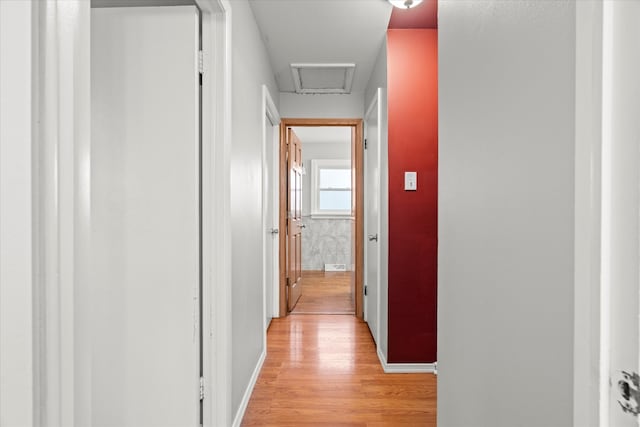 hallway featuring light hardwood / wood-style flooring