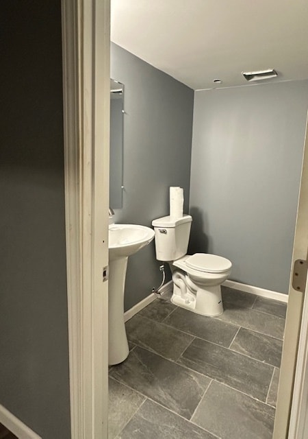 bathroom featuring toilet