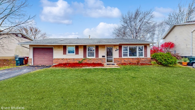 single story home with a front lawn and a garage