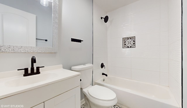 full bathroom with vanity, toilet, and tiled shower / bath