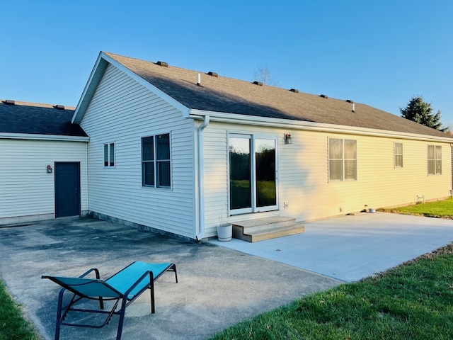 rear view of property with a patio