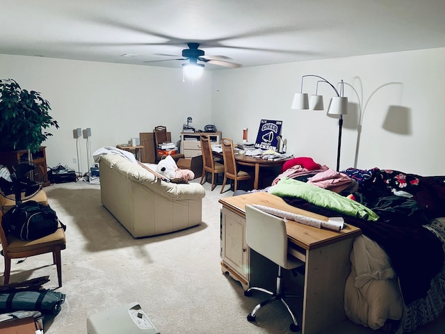 living room featuring carpet flooring and ceiling fan