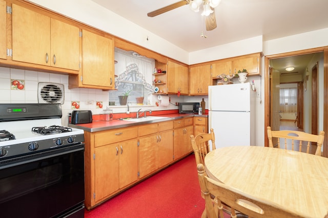 kitchen with sink, ceiling fan, tasteful backsplash, white fridge, and range