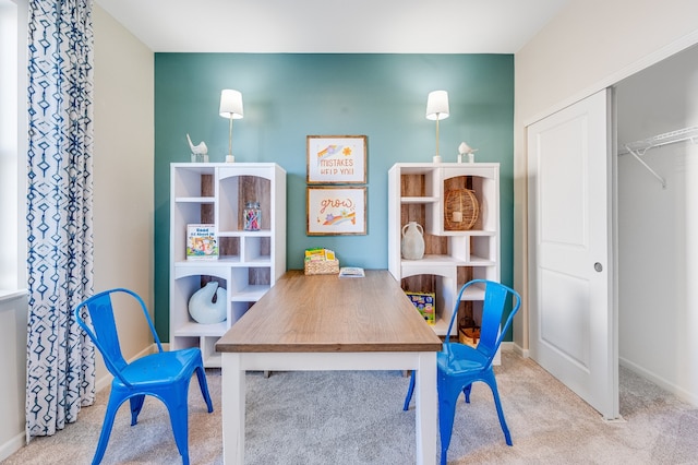 home office featuring carpet flooring and baseboards