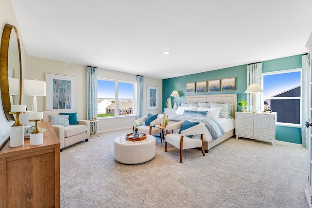 carpeted bedroom with baseboards