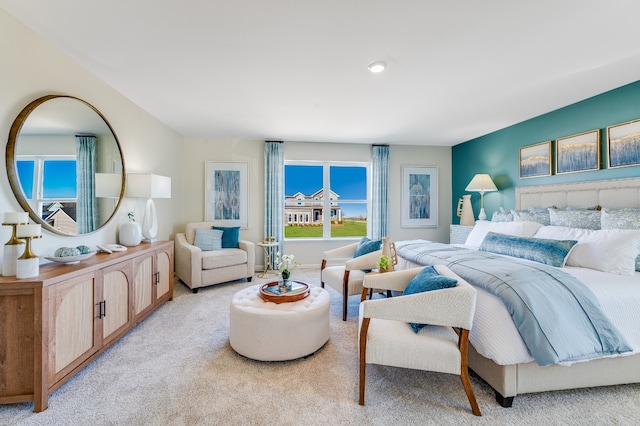 bedroom with light colored carpet