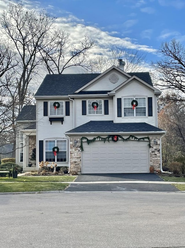 view of front property with a garage