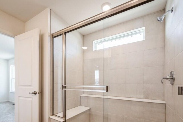 bathroom featuring walk in shower