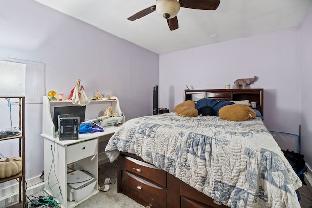 bedroom featuring light carpet and ceiling fan