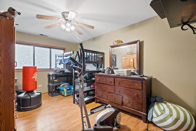 bedroom featuring ceiling fan and light hardwood / wood-style floors