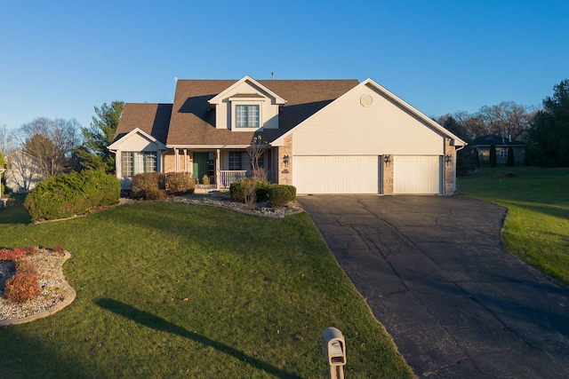 cape cod house featuring a porch, a garage, and a front lawn