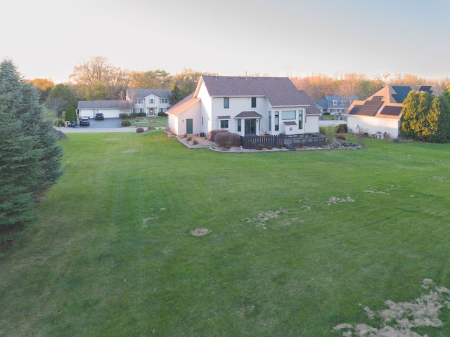 view of front of home featuring a yard