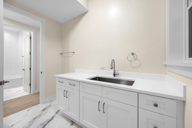 basement featuring light hardwood / wood-style flooring