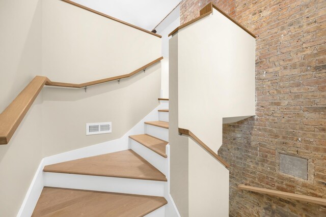 basement featuring light wood-type flooring