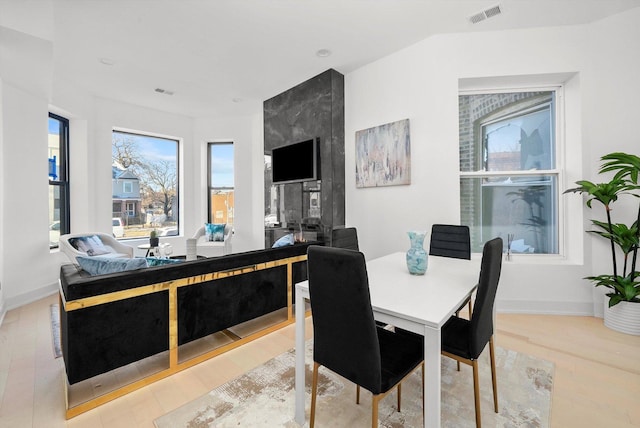 dining room with light hardwood / wood-style flooring