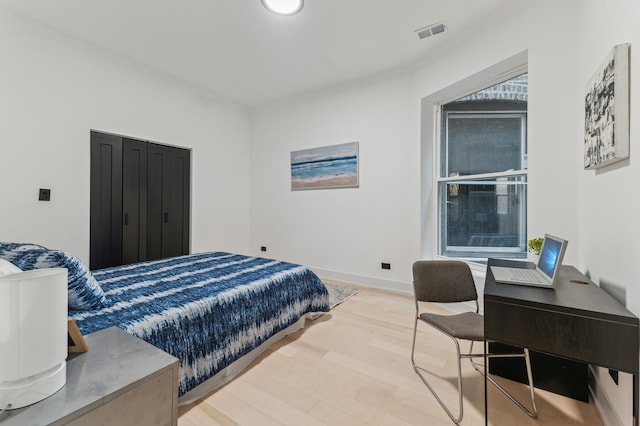 bedroom featuring light hardwood / wood-style flooring