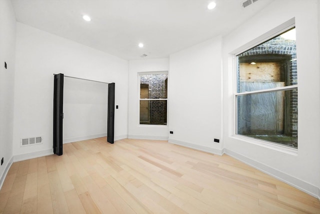 unfurnished bedroom featuring light hardwood / wood-style floors