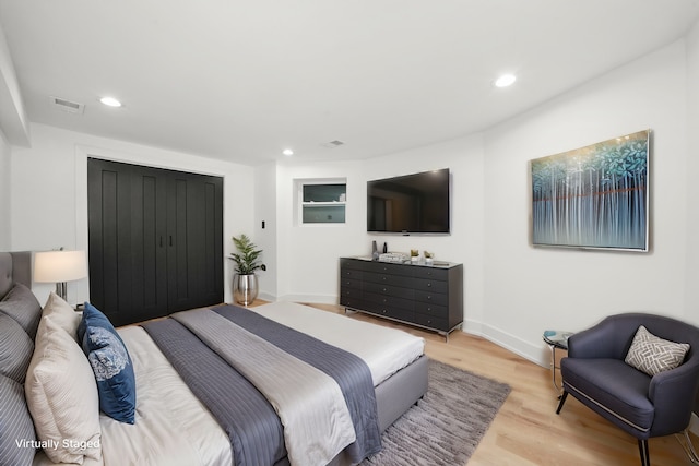 bedroom featuring light wood-type flooring