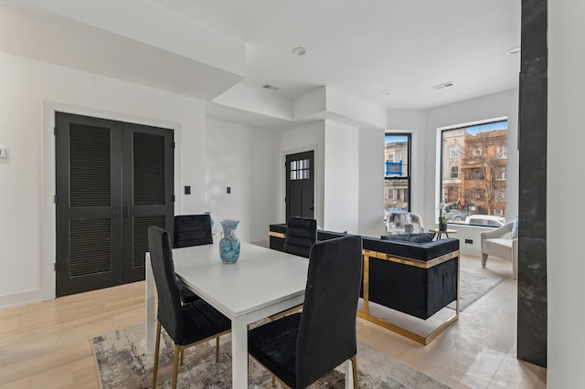 dining area featuring light hardwood / wood-style floors