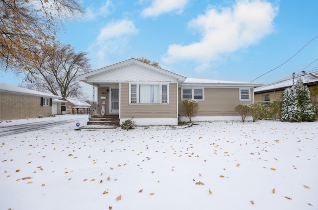 view of snow covered property