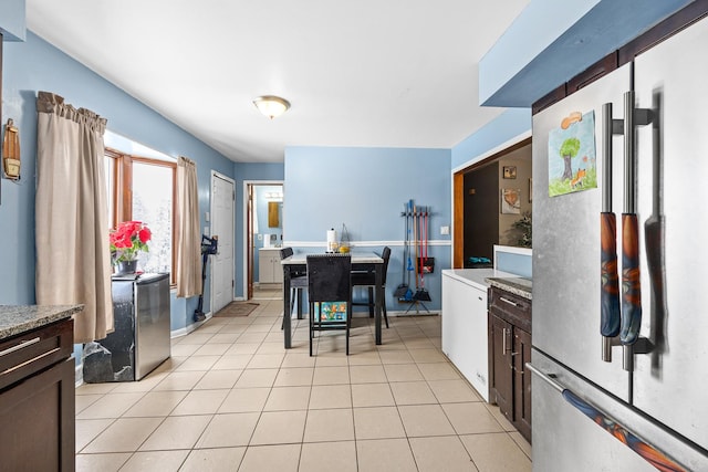 456 E 170th St, South Holland, IL 60473 - kitchen featuring stainless steel refrigerator, light countertops, light tile patterned floors, and dark brown cabinetry